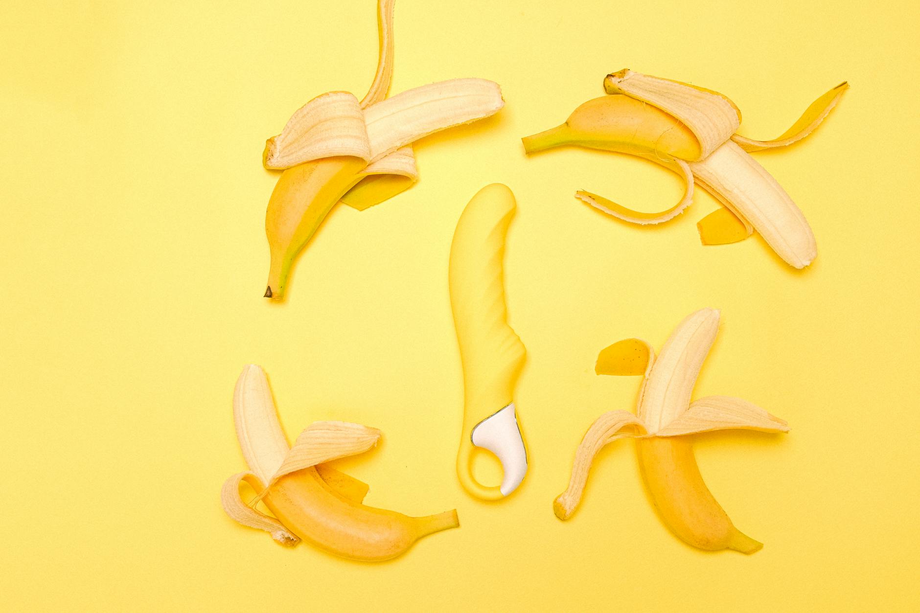 Array of vibrant clitoral vibrators including lemon-shaped options displayed together