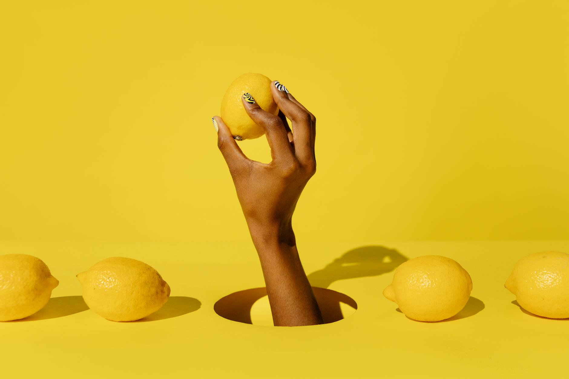 Intimate hands holding a sleek blue clitoral vibrator, symbolizing reconnection and renewal.